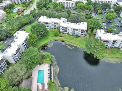 Beautiful 2-bedroom, 2-bath condominium with peaceful garden on Pine Island Ridge Country Club in Florida - for sale on GolfHomes.com, golf home, golf lot