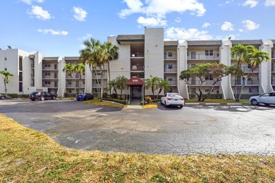 Beautiful 2-bedroom, 2-bath condominium with peaceful garden on Pine Island Ridge Country Club in Florida - for sale on GolfHomes.com, golf home, golf lot
