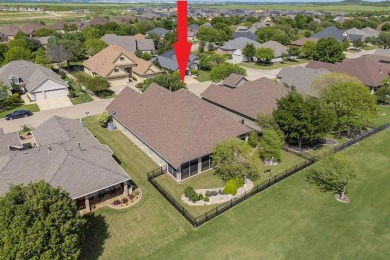 Beautiful single-story Marbella overlooking Hole 8 of the South on Wildhorse Golf Club of Robson Ranch in Texas - for sale on GolfHomes.com, golf home, golf lot