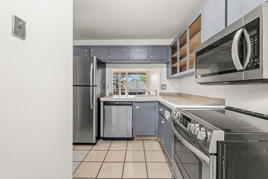 Beautiful 2-bedroom, 2-bath condominium with peaceful garden on Pine Island Ridge Country Club in Florida - for sale on GolfHomes.com, golf home, golf lot