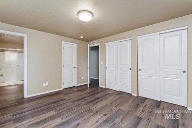 This inviting home features soaring vaulted ceilings upgraded on Hunters Point Golf Club in Idaho - for sale on GolfHomes.com, golf home, golf lot