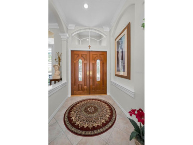 This beautifully maintained 4-bedroom, 3-bath residence is on Lansbrook Golf Club in Florida - for sale on GolfHomes.com, golf home, golf lot