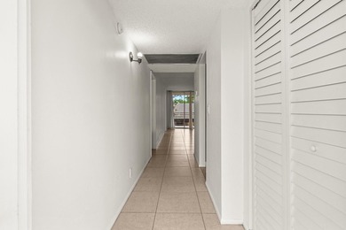 Beautiful 2-bedroom, 2-bath condominium with peaceful garden on Pine Island Ridge Country Club in Florida - for sale on GolfHomes.com, golf home, golf lot