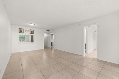 Beautiful 2-bedroom, 2-bath condominium with peaceful garden on Pine Island Ridge Country Club in Florida - for sale on GolfHomes.com, golf home, golf lot
