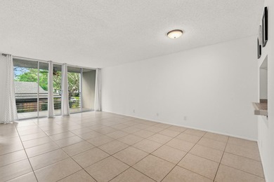 Beautiful 2-bedroom, 2-bath condominium with peaceful garden on Pine Island Ridge Country Club in Florida - for sale on GolfHomes.com, golf home, golf lot