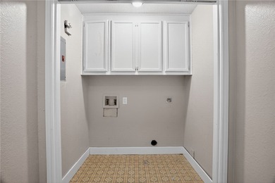 Welcome to 107 Cherry Hills Drive, located in the beautiful on Rockport Country Club in Texas - for sale on GolfHomes.com, golf home, golf lot