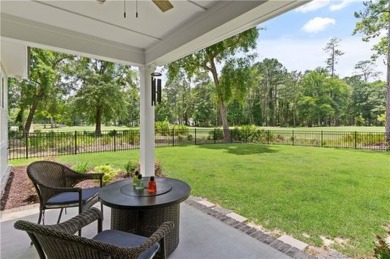 This one of a kind home is nestled between the #1 putting green on The Golf Club At Sanctuary Cove in Georgia - for sale on GolfHomes.com, golf home, golf lot