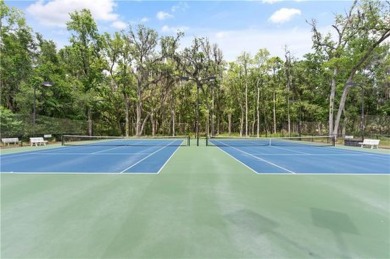 This one of a kind home is nestled between the #1 putting green on The Golf Club At Sanctuary Cove in Georgia - for sale on GolfHomes.com, golf home, golf lot