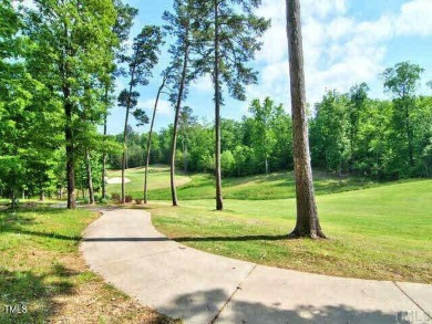 Welcome to this exquisite custom-built brick home in the highly on The Preserve At Jordan Lake Golf Club in North Carolina - for sale on GolfHomes.com, golf home, golf lot