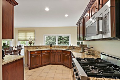 Welcome to this immaculately maintained home in the lovely gated on Boulder Ridge Country Club in Illinois - for sale on GolfHomes.com, golf home, golf lot