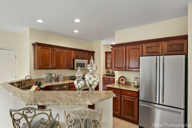 Welcome to this immaculately maintained home in the lovely gated on Boulder Ridge Country Club in Illinois - for sale on GolfHomes.com, golf home, golf lot
