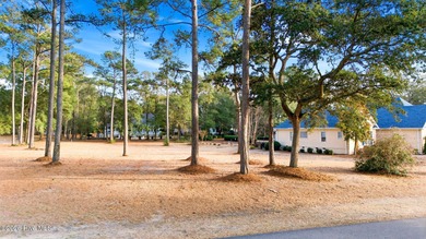 This beautiful homesite at 3266 Channelside Drive, Supply, NC on Lockwood Folly Country Club in North Carolina - for sale on GolfHomes.com, golf home, golf lot