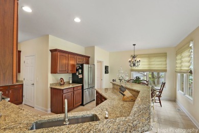 Welcome to this immaculately maintained home in the lovely gated on Boulder Ridge Country Club in Illinois - for sale on GolfHomes.com, golf home, golf lot