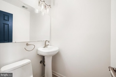 Welcome home to this beautifully renovated townhouse at 2134 on Reston National Golf Course in Virginia - for sale on GolfHomes.com, golf home, golf lot