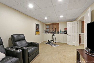 Welcome to this immaculately maintained home in the lovely gated on Boulder Ridge Country Club in Illinois - for sale on GolfHomes.com, golf home, golf lot