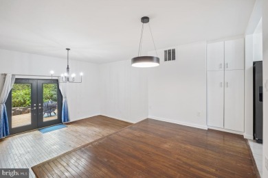 Welcome home to this beautifully renovated townhouse at 2134 on Reston National Golf Course in Virginia - for sale on GolfHomes.com, golf home, golf lot