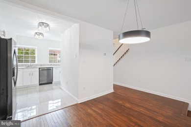 Welcome home to this beautifully renovated townhouse at 2134 on Reston National Golf Course in Virginia - for sale on GolfHomes.com, golf home, golf lot