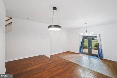 Welcome home to this beautifully renovated townhouse at 2134 on Reston National Golf Course in Virginia - for sale on GolfHomes.com, golf home, golf lot