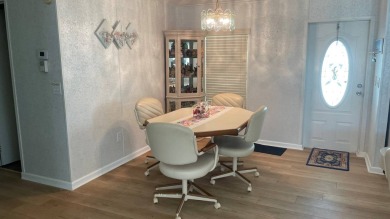 This home is located in the upscale 55+ gated community - The on Sabal Springs Golf and Racquet Club in Florida - for sale on GolfHomes.com, golf home, golf lot