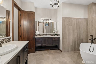 Perfectly positioned on the third green of Rope Rider, at the on Suncadia Resort in Washington - for sale on GolfHomes.com, golf home, golf lot