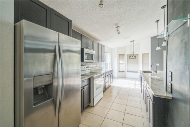 Charming 3BR/2BA home in Oakwood Golf Club! Built in 2002, this on Oakwood Golf Club in Florida - for sale on GolfHomes.com, golf home, golf lot