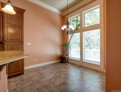 Custom Craftsman-style home with an open floor plan, cathedral on Granada Golf Course in Arkansas - for sale on GolfHomes.com, golf home, golf lot