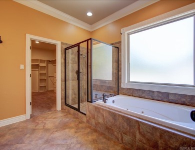 Custom Craftsman-style home with an open floor plan, cathedral on Granada Golf Course in Arkansas - for sale on GolfHomes.com, golf home, golf lot
