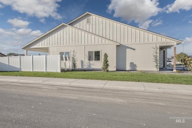 This FOUR BEDROOM home is placed perfectly on a corner lot for on Scotch Pines Golf Course in Idaho - for sale on GolfHomes.com, golf home, golf lot