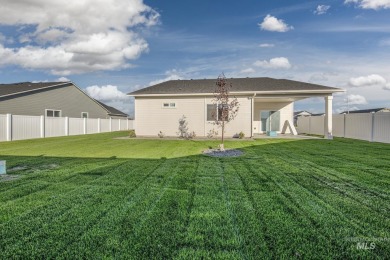 This FOUR BEDROOM home is placed perfectly on a corner lot for on Scotch Pines Golf Course in Idaho - for sale on GolfHomes.com, golf home, golf lot