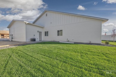 This FOUR BEDROOM home is placed perfectly on a corner lot for on Scotch Pines Golf Course in Idaho - for sale on GolfHomes.com, golf home, golf lot