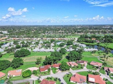 Welcome to Pines 2 at Woodmont! Stunning golf course views from on Woodmont Country Club in Florida - for sale on GolfHomes.com, golf home, golf lot