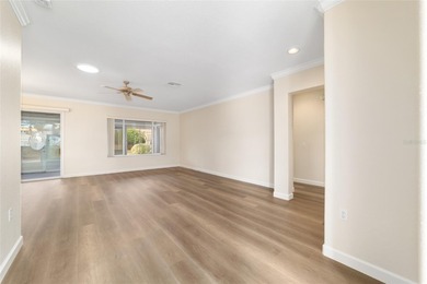 Welcome home and step into this popular Sanibel model on Eagle Ridge At Spruce Creek Country Club in Florida - for sale on GolfHomes.com, golf home, golf lot