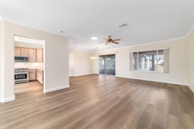 Welcome home and step into this popular Sanibel model on Eagle Ridge At Spruce Creek Country Club in Florida - for sale on GolfHomes.com, golf home, golf lot