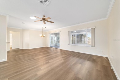 Welcome home and step into this popular Sanibel model on Eagle Ridge At Spruce Creek Country Club in Florida - for sale on GolfHomes.com, golf home, golf lot