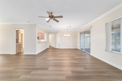 Welcome home and step into this popular Sanibel model on Eagle Ridge At Spruce Creek Country Club in Florida - for sale on GolfHomes.com, golf home, golf lot