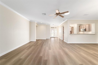 Welcome home and step into this popular Sanibel model on Eagle Ridge At Spruce Creek Country Club in Florida - for sale on GolfHomes.com, golf home, golf lot