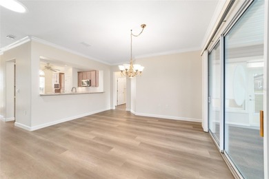 Welcome home and step into this popular Sanibel model on Eagle Ridge At Spruce Creek Country Club in Florida - for sale on GolfHomes.com, golf home, golf lot