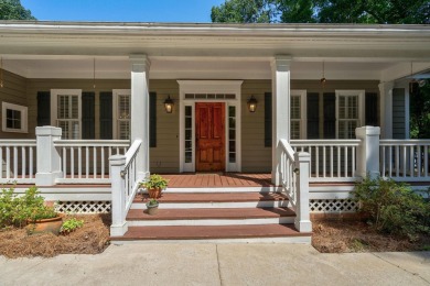 Discover timeless Southern elegance and luxury lakefront living on Great Waters Course At Reynolds Plantation in Georgia - for sale on GolfHomes.com, golf home, golf lot