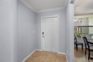 Impeccably maintained first-floor residence, being sold turn key on Lakewood National Golf Club in Florida - for sale on GolfHomes.com, golf home, golf lot