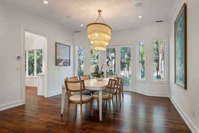 Set on a generous, level homesite overlooking a tranquil lagoon on Kiawah Island Resort - Cougar Point in South Carolina - for sale on GolfHomes.com, golf home, golf lot