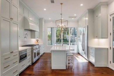 Set on a generous, level homesite overlooking a tranquil lagoon on Kiawah Island Resort - Cougar Point in South Carolina - for sale on GolfHomes.com, golf home, golf lot