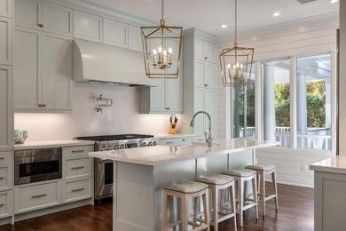 Set on a generous, level homesite overlooking a tranquil lagoon on Kiawah Island Resort - Cougar Point in South Carolina - for sale on GolfHomes.com, golf home, golf lot