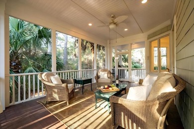 Set on a generous, level homesite overlooking a tranquil lagoon on Kiawah Island Resort - Cougar Point in South Carolina - for sale on GolfHomes.com, golf home, golf lot