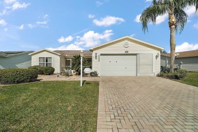 Welcome to this Designer home in The Villages! NO BOND, ROOF on The Links of Spruce Creek in Florida - for sale on GolfHomes.com, golf home, golf lot