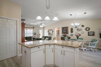 Welcome to this Designer home in The Villages! NO BOND, ROOF on The Links of Spruce Creek in Florida - for sale on GolfHomes.com, golf home, golf lot