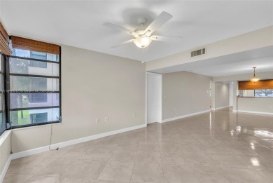 If you are looking for a condo with a view, look no further on Pine Island Ridge Country Club in Florida - for sale on GolfHomes.com, golf home, golf lot