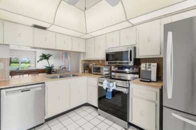 Live the Florida lifestyle in this beautifully FURNISHED on Isla Del Sol Yacht and Country Club in Florida - for sale on GolfHomes.com, golf home, golf lot