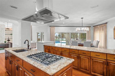 Stunning golf and lake views and beautifully updated grounds are on Isleworth Golf and Country Club in Florida - for sale on GolfHomes.com, golf home, golf lot