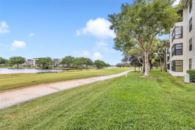 If you are looking for a condo with a view, look no further on Pine Island Ridge Country Club in Florida - for sale on GolfHomes.com, golf home, golf lot