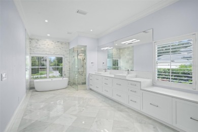 Stunning golf and lake views and beautifully updated grounds are on Isleworth Golf and Country Club in Florida - for sale on GolfHomes.com, golf home, golf lot